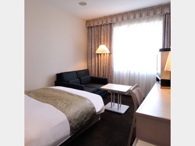 洋室（シングル+エキストラベッド）の一例