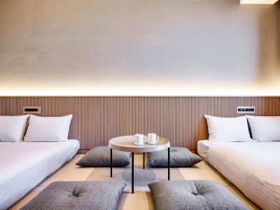 和モダンツイン｜小上がりの畳の上に、ロータイプベッドとローテーブルを設置しています。