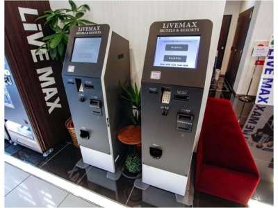 非接触自動チェックイン機