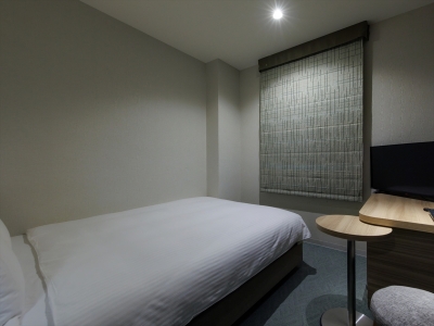 【スタンダードダブル（南館）15㎡】「コーラルグリーン」がアクセントの明るく洗練された空間